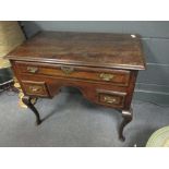 An 18th century oak low boy, crossbanded in mahogany, on cabriole legs, 73 x 88 x 48cm