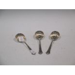 Three silver spoons with shell bowls, Sheffield 1886, makers mark HH, 8.9oz