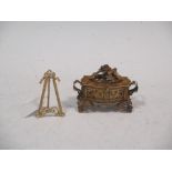 A silver gilt filigree trinket box and a miniture gilt metal easel