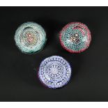 Three Whitefriars facetted millefiori paperweights, each with designs of concentric bands, date