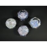 Four Whitefriars spoke design paperweights, one boxed and each with signature cane and dates for