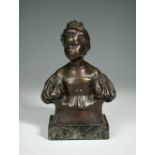 § Alfred Drury (British, 1856-1944), The age of innocence (bust of Gracie Doncaster), bronze, with
