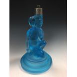 A Walther & Sohne Art Deco blue glass figural lamp base, modelled as a partially draped female