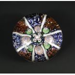 A St. Louis panel panel paperweight, circa 1850, the white spokes interspersed with millefiori on