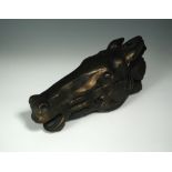 A limited edition bronze horse's head, indistinctly signed to underside and numbered 125 of 2000,