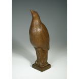 After James Woodford, RA (British, 1893 - 1976), a cold cast bronze of a bird, the stylised model