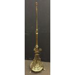 An Aesthetic period brass standard lamp, the patent telescopic column above pierced supports and