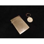 A contemporary silver card case and accompanying perpetual calendar keyring by Philip Kydd, London