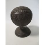 An Indian carved coconut cup and cover