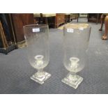 A pair of engraved and cut glass storm lanterns (2). Height 38cm.