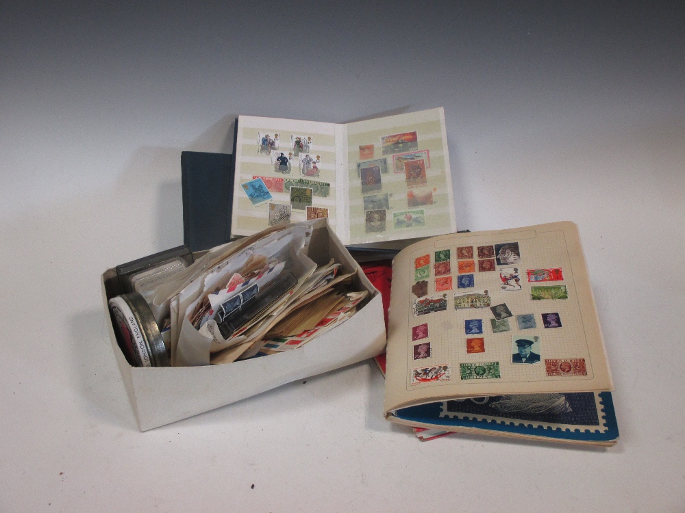 A quantity of stamps some loose and some in albums