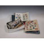 A quantity of stamps some loose and some in albums