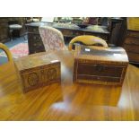 A Georgian tea caddy inlaid with paterae and an early 19th century domed top domed top box with