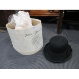 A cardboard boxed Lock and Co. bowler hat