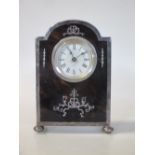 A silver mounted tortoiseshell table clock