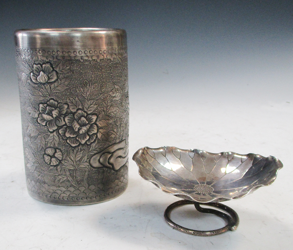 A silver brush pot and Wang Hing, a silver lotus leaf dish, the cylindrical sides of the first