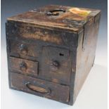 A 19th century scribe's cabinet, an iron handle to the hinged rectangular lid opening onto a