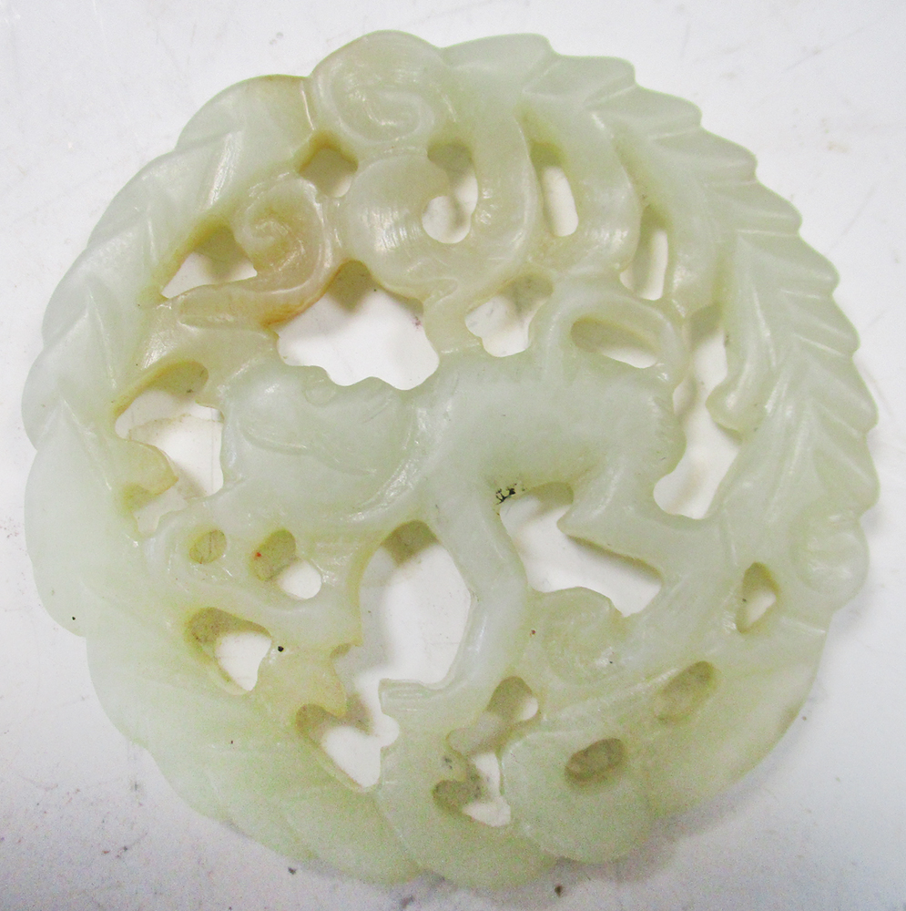 A jade pendant together with a snuff bottle and stopper, the first a roundel pierced and carved with - Image 2 of 5