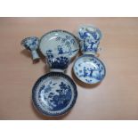 A late Ming blue and white stem cup, a covered bowl, a saucer with two cups and saucers, the