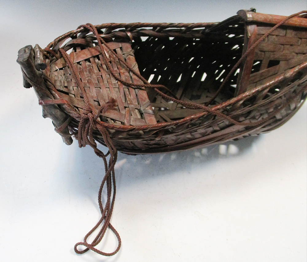 A bamboo basket work ikebana ship, the rustic boom raised before a canopy over the bow, the seat - Image 3 of 4