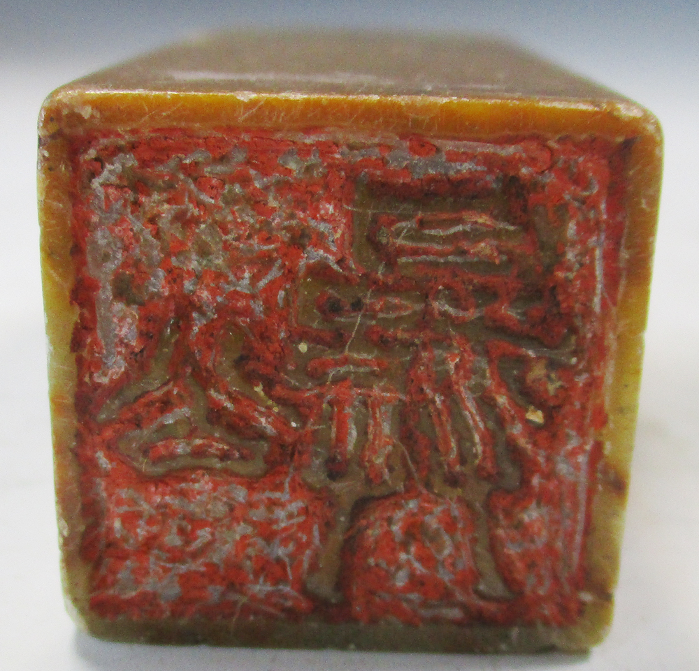 Three soapstone seals, the two similar seals of mottled toffee colour, of square section, with domed - Image 2 of 8