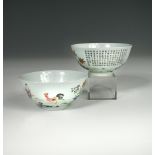 A pair of famille rose bowls, each exterior painted with a boy, cockerel, inscriptions and blue