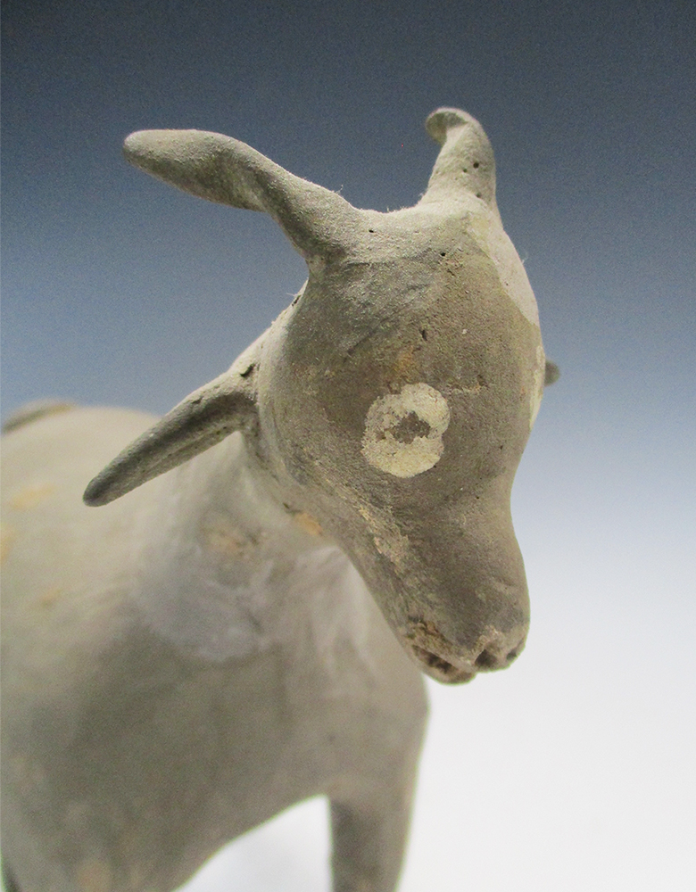 A pair of Han dynasty grey pottery goats, each characterful figure standing four square, its eyes - Image 2 of 7