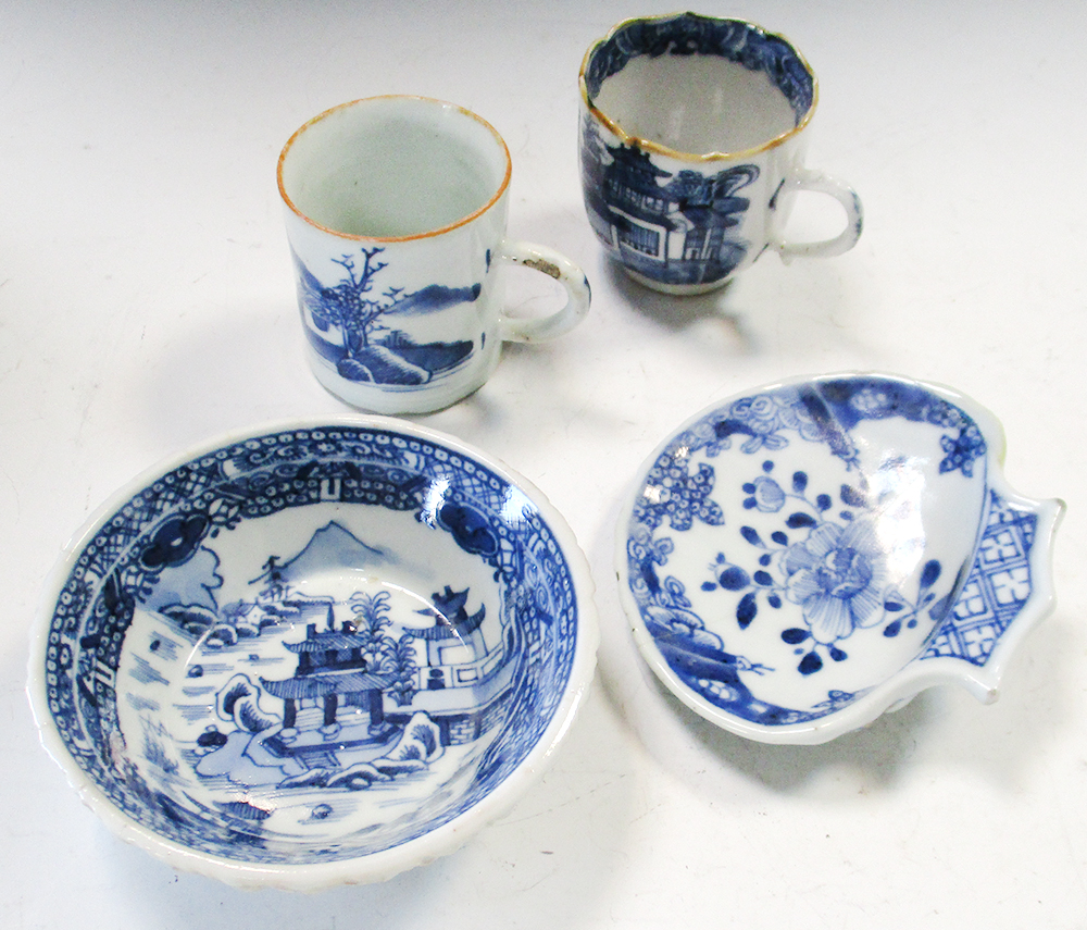 Four 18th century blue and white wares, the patty pan, coffee cup and can painted with islands,