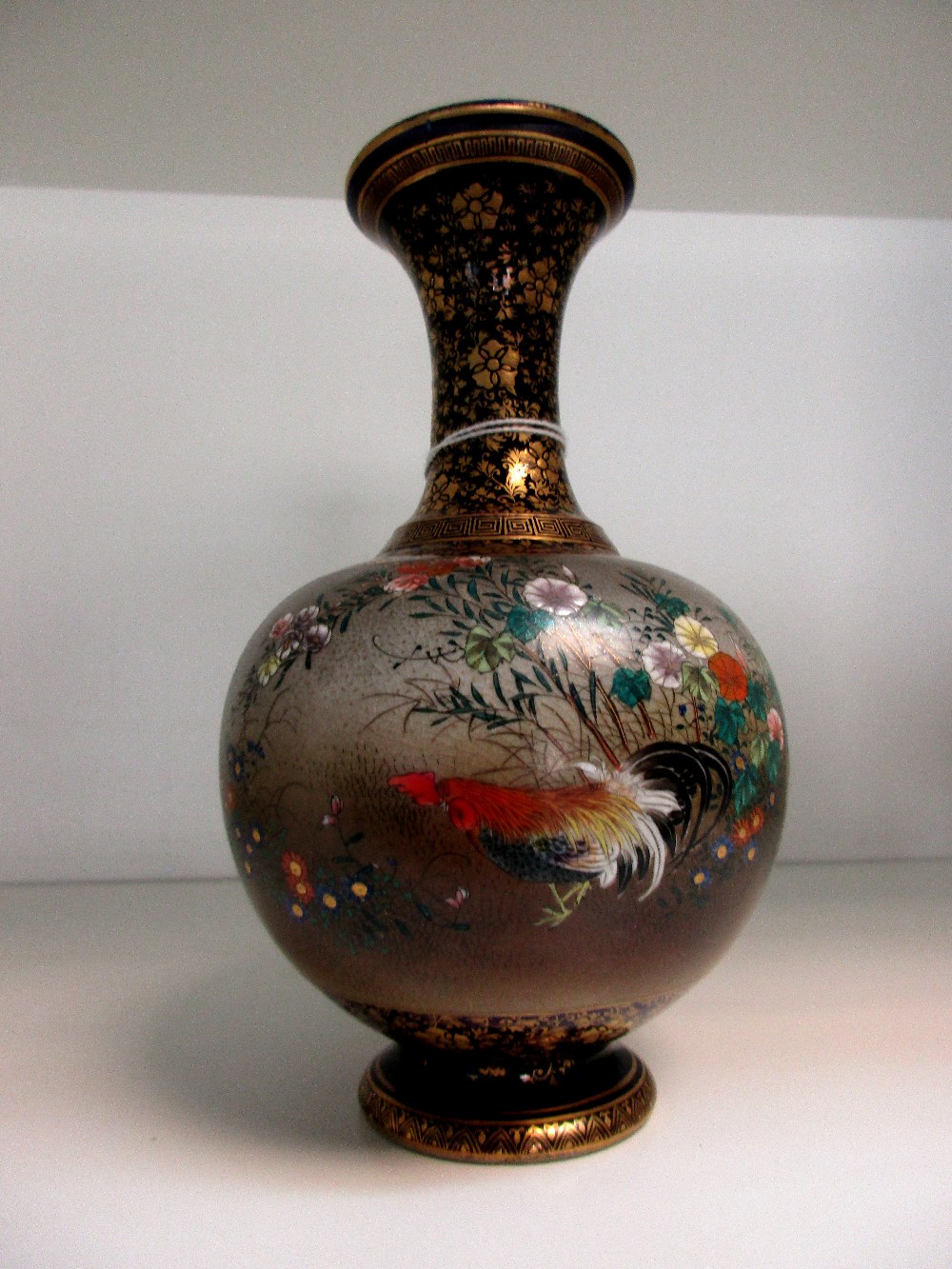 An early 20th century Satsuma blue ground baluster vase, the compressed spherical body painted on - Image 2 of 3