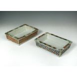 Two similar 19th century rectangular crocus pots, the Canton style floral rims above reticulated