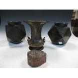 A pair of polygonal bronze vases, possibly 20th century Taiwanese, the sides with incised line