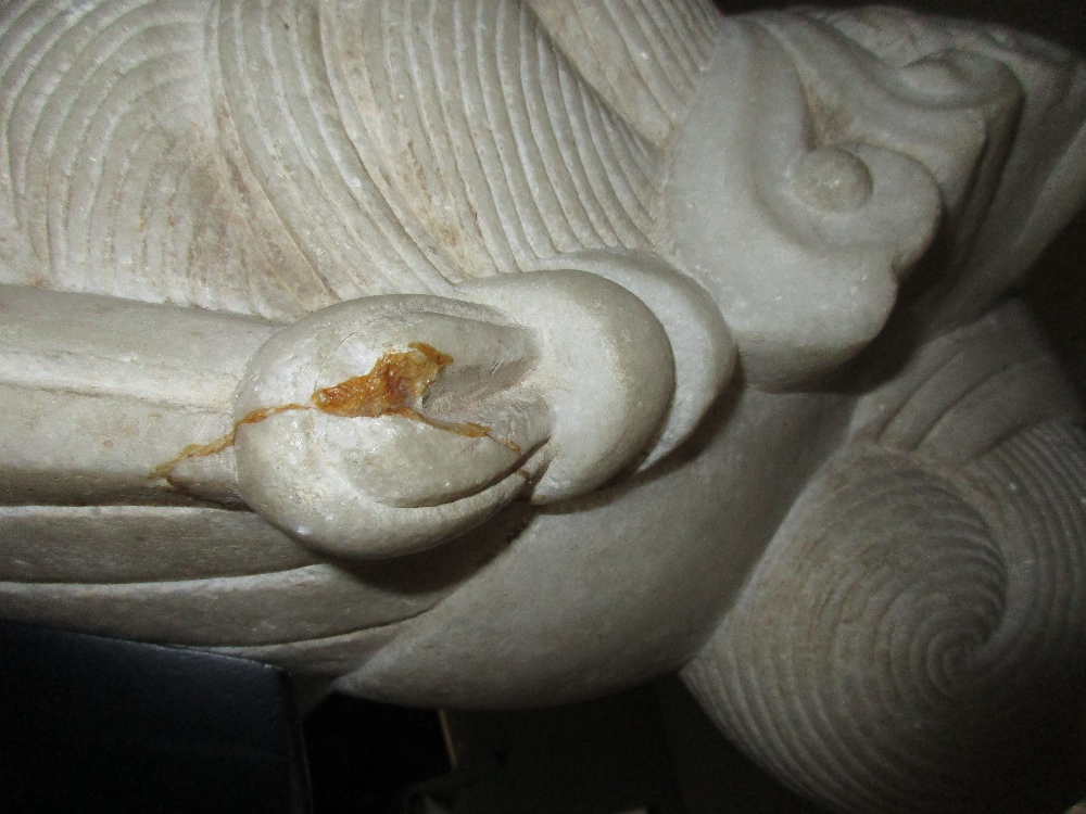 A late 19th/early 20th century white marble head of Guanyin, her headdress centred by a rosette - Image 2 of 3