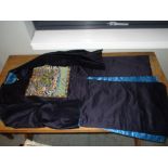 A black silk robe bearing the civil third rank badge, the plain black robe with blue lining, the