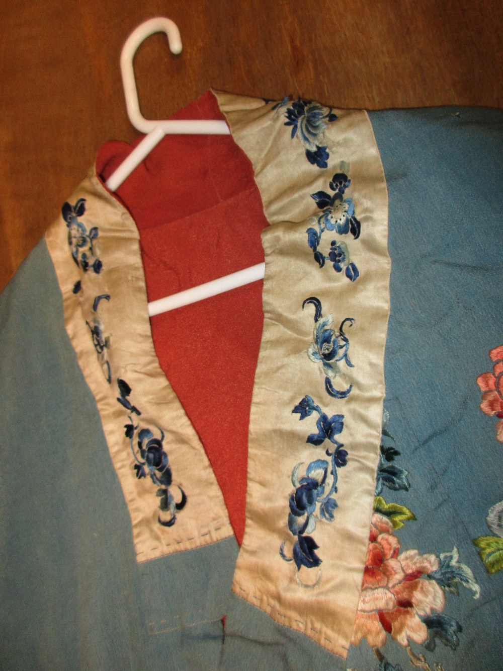 A late 19th/early 20th century turquoise silk jacket, embroidered with butterflies amongst scattered - Image 7 of 9