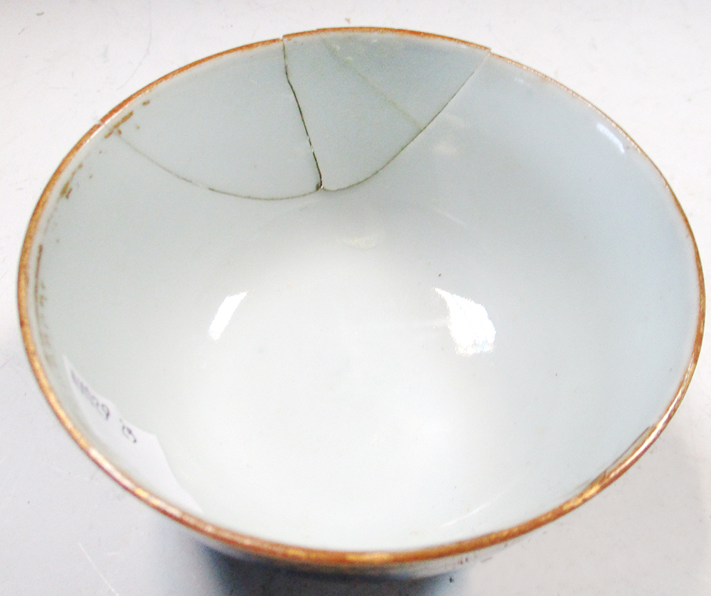 An 18th century enamel tray, four tea bowls and a blue and white cover, the tray painted with an - Image 15 of 19