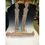 Three Han dynasty grey pottery tomb figures, the standing men, once with textile clothes to disguise