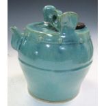A Ming turquoise glazed water vessel with later stopper, a carrying handle to the top of the