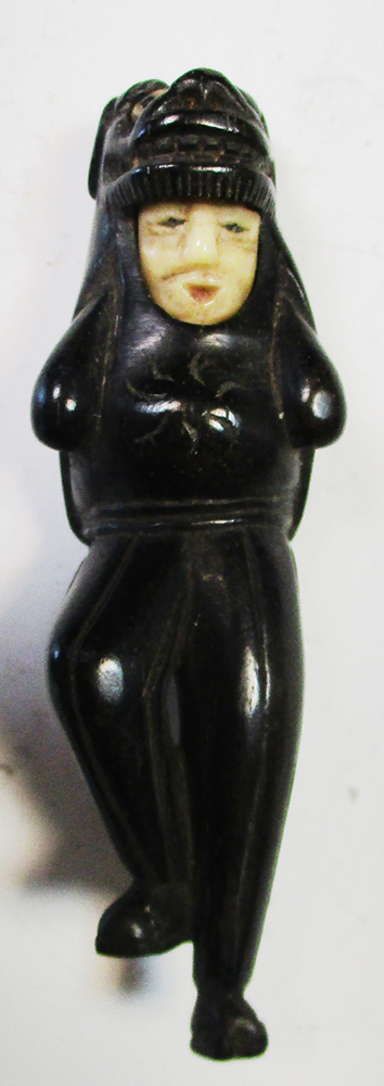 A Kobe Daruma toy and a lion masked man netsuke, the first depicting the monk wrapped in his - Image 2 of 6