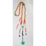 A mandarin's necklace, the main set of beads to imitate amber, interspaced with larger beads to