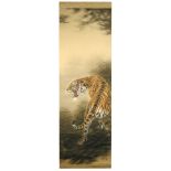 A 20th century watercolour scroll painted with a tiger climbing a prominence amongst reeds with a