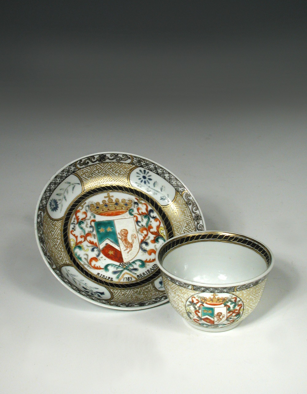 An armorial tea bowl and saucer and another famille rose, the first bearing the arms of the Dutch - Image 3 of 3