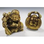 Two late 19th/early 20th century marine ivory netsuke, Ebisu seated with a child in the sack that he