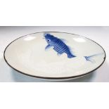 An Arita blue and white plate moulded and painted with two carp swimming within a copper mounted