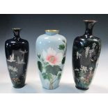 Three early 20th century cloisonne vases, the two blue ground vases enamelled with birds and
