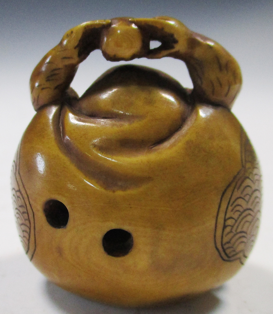 Two late 19th/early 20th century marine ivory netsuke, Ebisu seated with a child in the sack that he - Image 7 of 8