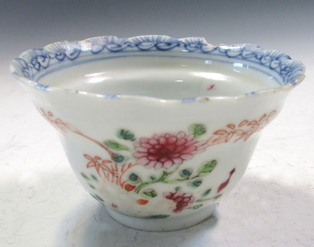 An 18th century enamel tray, four tea bowls and a blue and white cover, the tray painted with an - Image 8 of 19