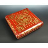 A 19th century red lacquer box, the lift off lid gilt with a roundel of two butterflies within