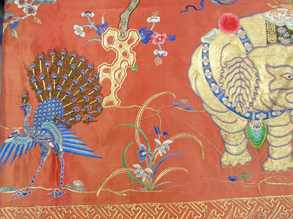 A red silk over lintel panel, embroidered in gold thread and coloured silks with a central - Image 3 of 7