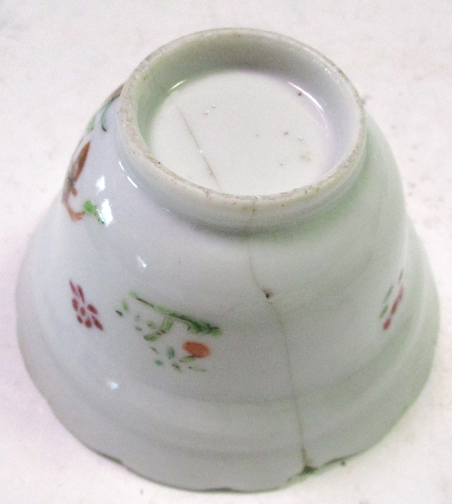 An 18th century enamel tray, four tea bowls and a blue and white cover, the tray painted with an - Image 10 of 19