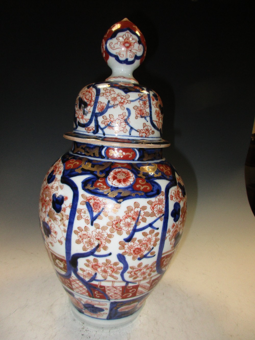 A late 19th/early 20th century Imari jar and cover, the ovoid body painted with two blue framed - Image 2 of 3